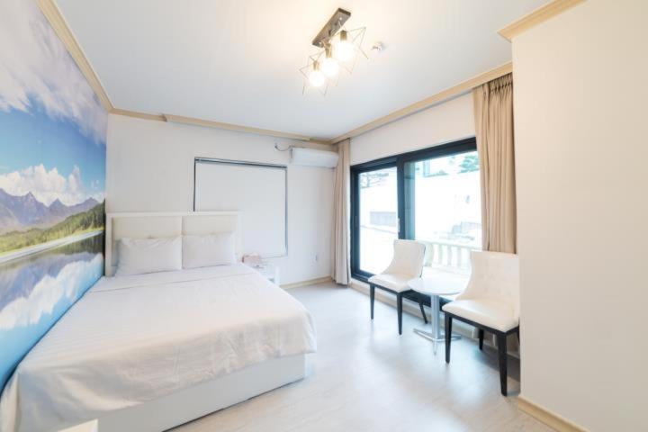 Songrim Motel Сокчхо Екстер'єр фото